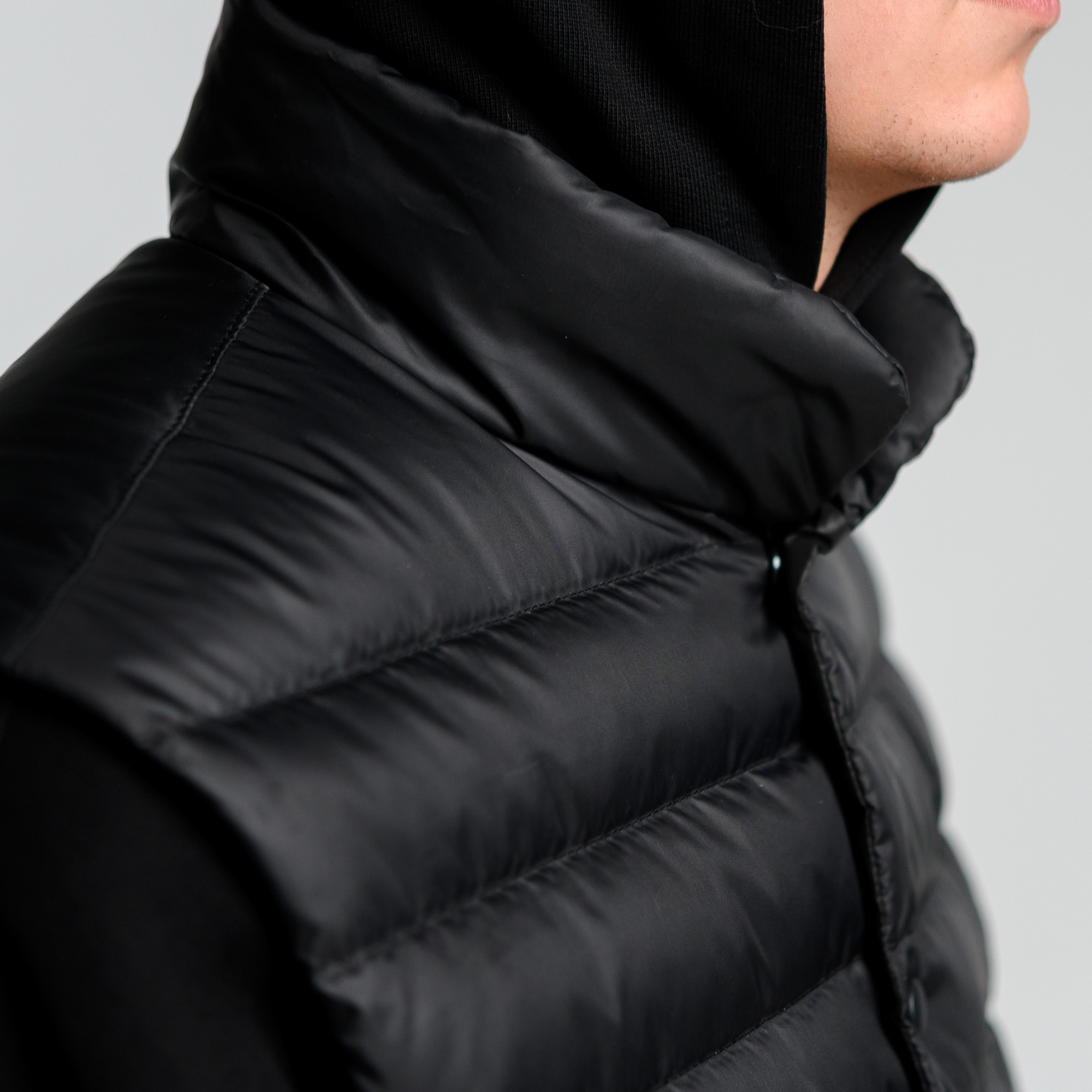 Легкий пуховой жилет